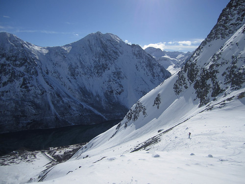 Rob slashing spring snow in the sunshine