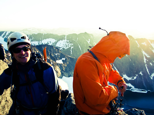 All smiles on the ledge near summit of Vesttoppen